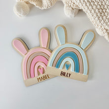 Load image into Gallery viewer, Two colorful rainbow-shaped nameplates with 'Mabel' and 'Billy' on a light background.