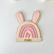 Load image into Gallery viewer, Decorative wall hanging with rainbow design and 'MABEL' text on a light background

